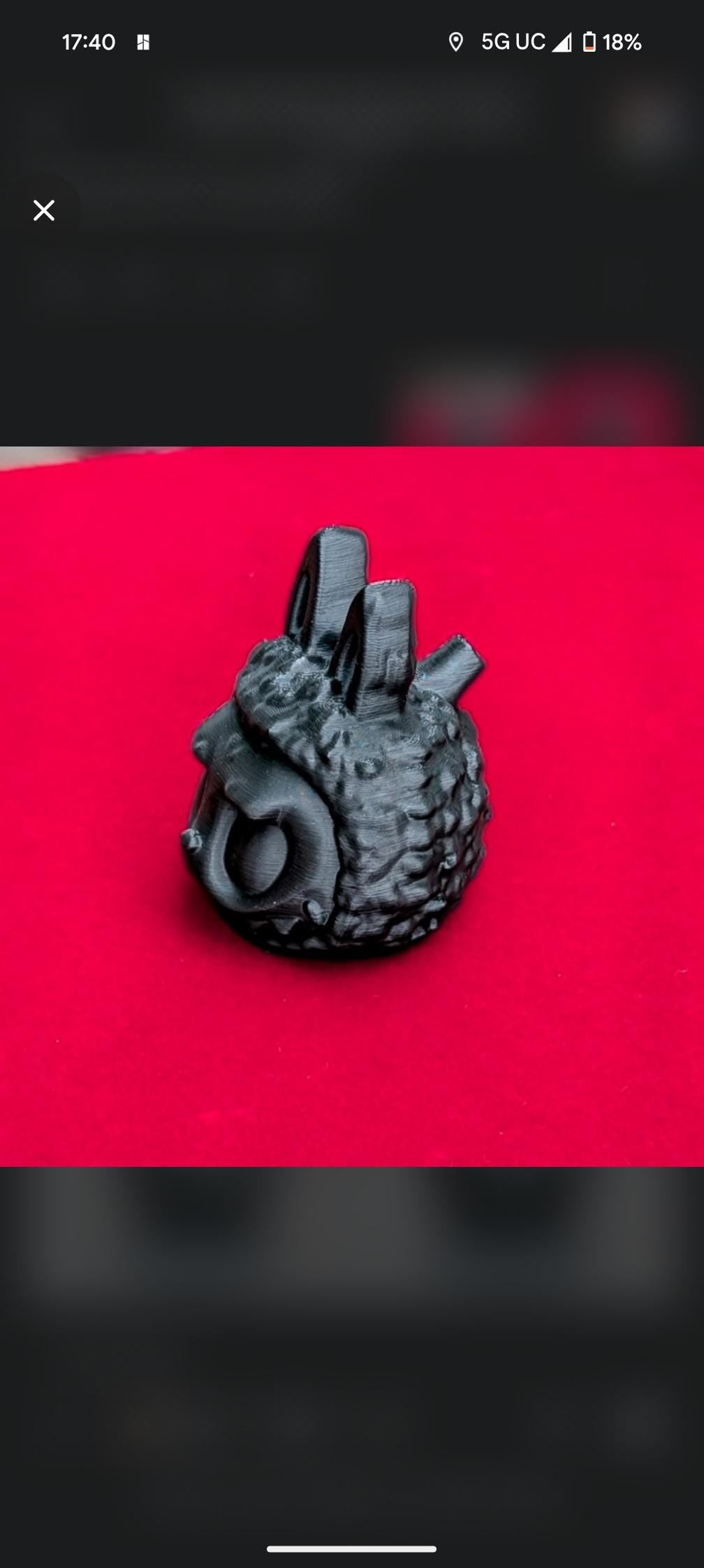 Blacked-out Labubu death whistle. Sounds scary AF or your money back.