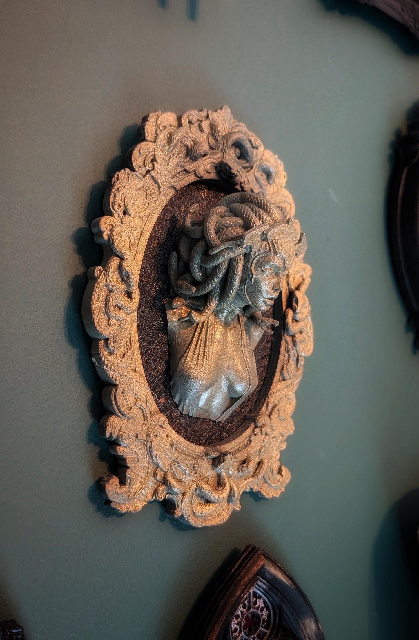 Medusa in Ornate Snake-Pattern Frame