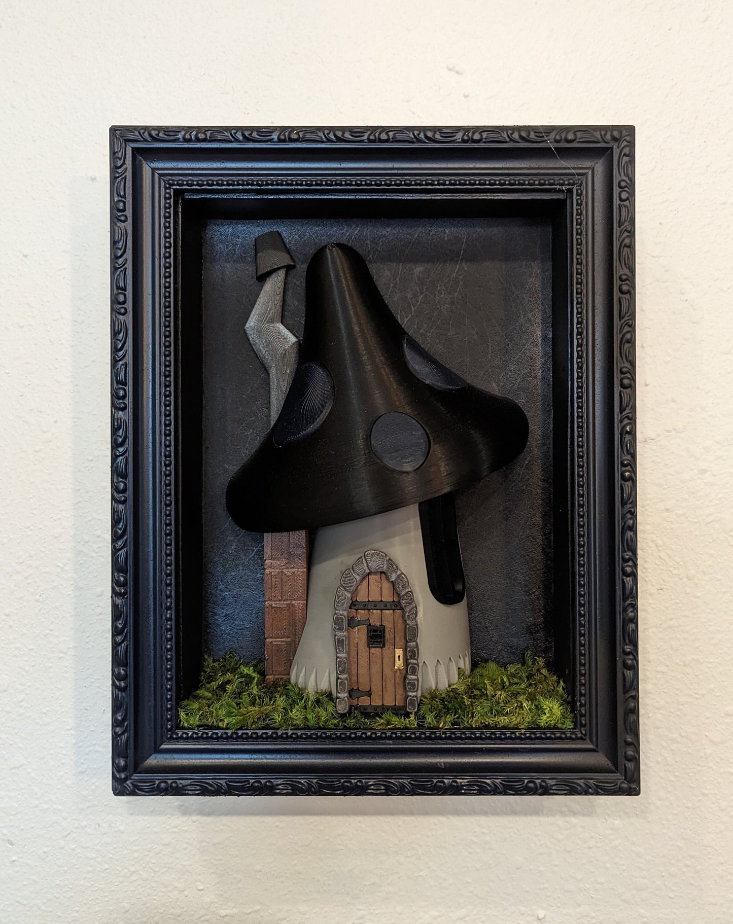 Gothic mushroom house in shadowbox frame.