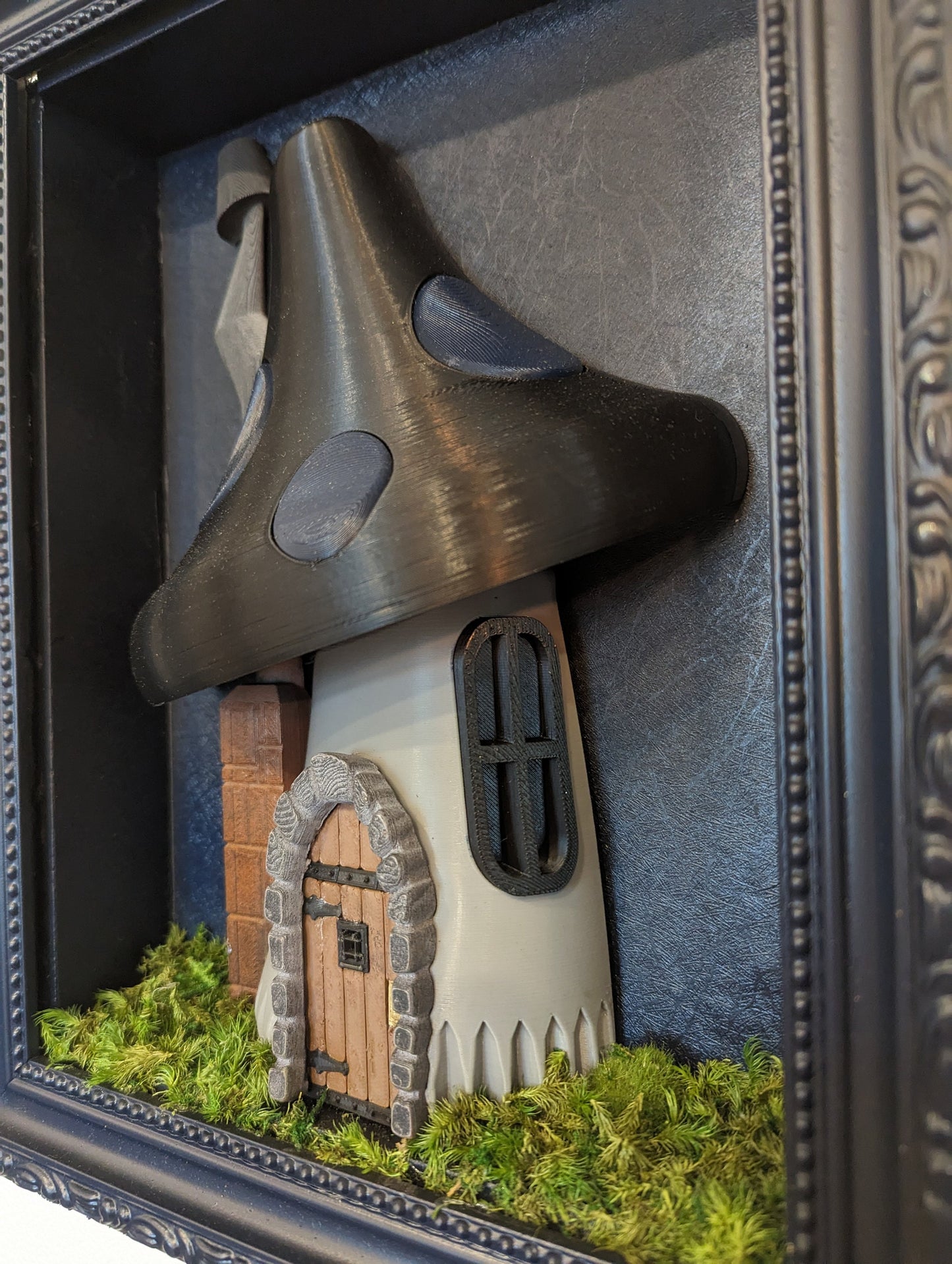 Gothic mushroom house in shadowbox frame.