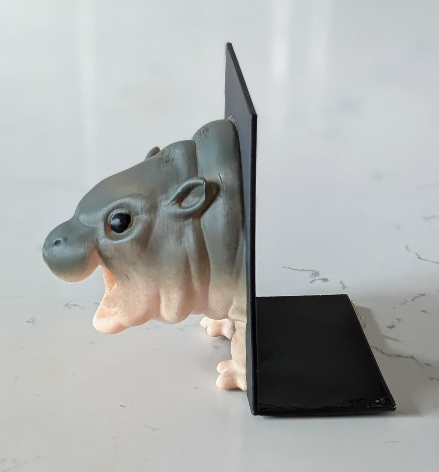 Custom Moo Deng, the pigmy hippo bookend.