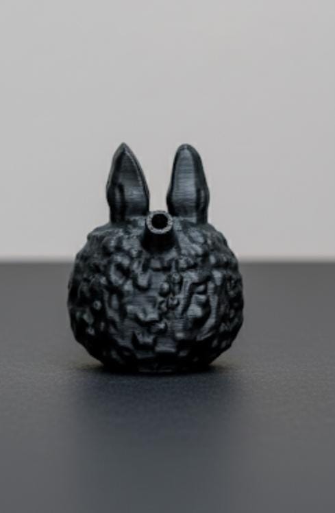 Blacked-out Labubu death whistle. Sounds scary AF or your money back.